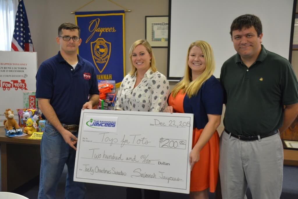 (LEFT to RIGHT) SSt. Riddle, Marine Toys for Tots; Lauren Matthews, Cheryl Lawrence and Will Gruver, with the Savannah Jaycees