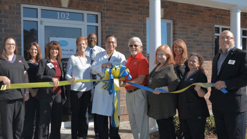 Dr. Daniel Most of Most Plastic & Reconstructive Surgery, PC cuts ribbon on Pooler office.