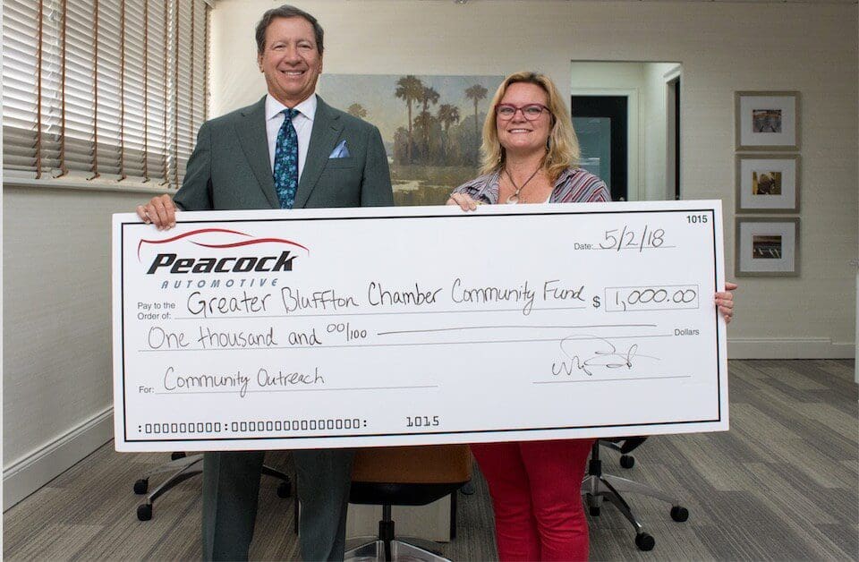 Peacock Automotive President & CEO Warner Peacock presented Shellie West, CEO of the Greater Bluffton Chamber of Commerce, a check for $1,000 to kick off the fundraising efforts of the Greater Bluffton Chamber Community Fund