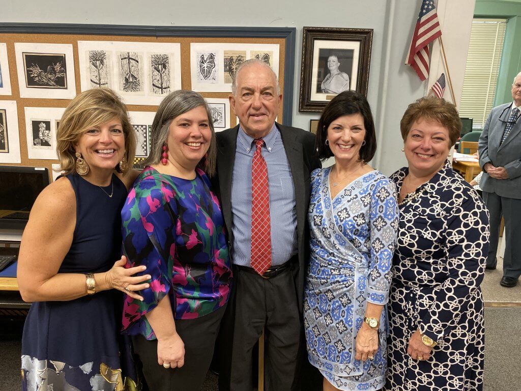 Charles Russo with his four daughters at the St. Vincent’s Academy library dedication ceremony